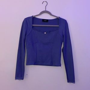 Purple long sleeve top. Barely worn, new condition. Original price $18. Medium.